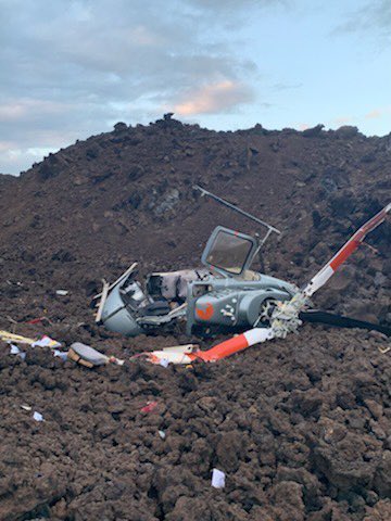 Photos from Hawaii County show tour helicopter crash in lava field near South Point on Big Island - 6 people on board taken to the hospital, including pilot who was initially trapped 